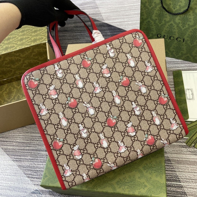 G*u*i shopping bags